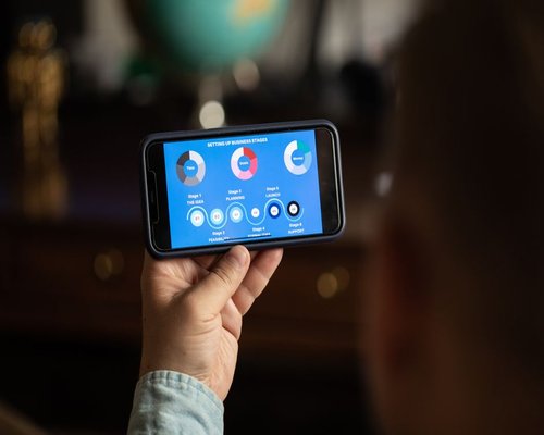Horizontal smartphone displaying the fictional Skyline Branch Logic puzzle game interface